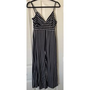 Brand New NWT, Iris Basic Black and White striped V-Neck Jumpsuit.